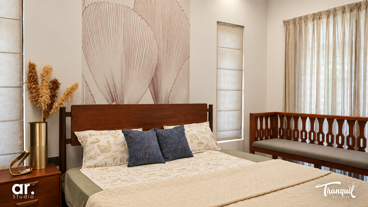 Ajish Residency — the master bedroom with its painted headboard wall