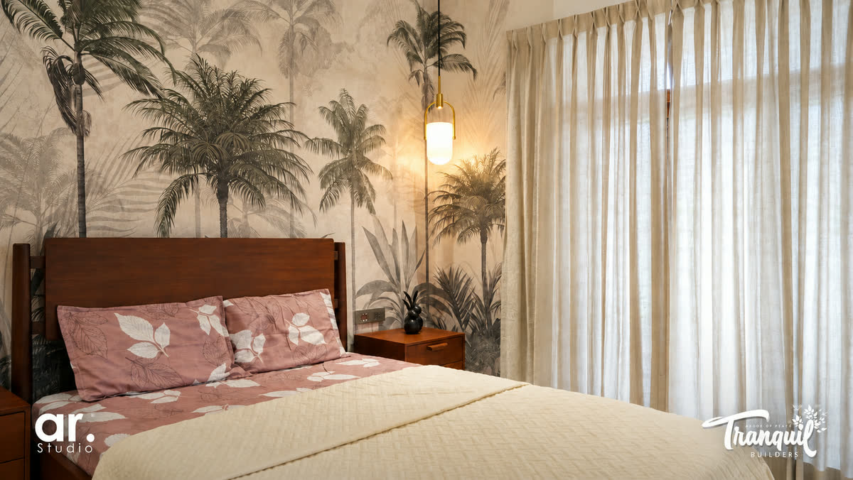 Ajish Residency — a bedroom framed by the palm mural