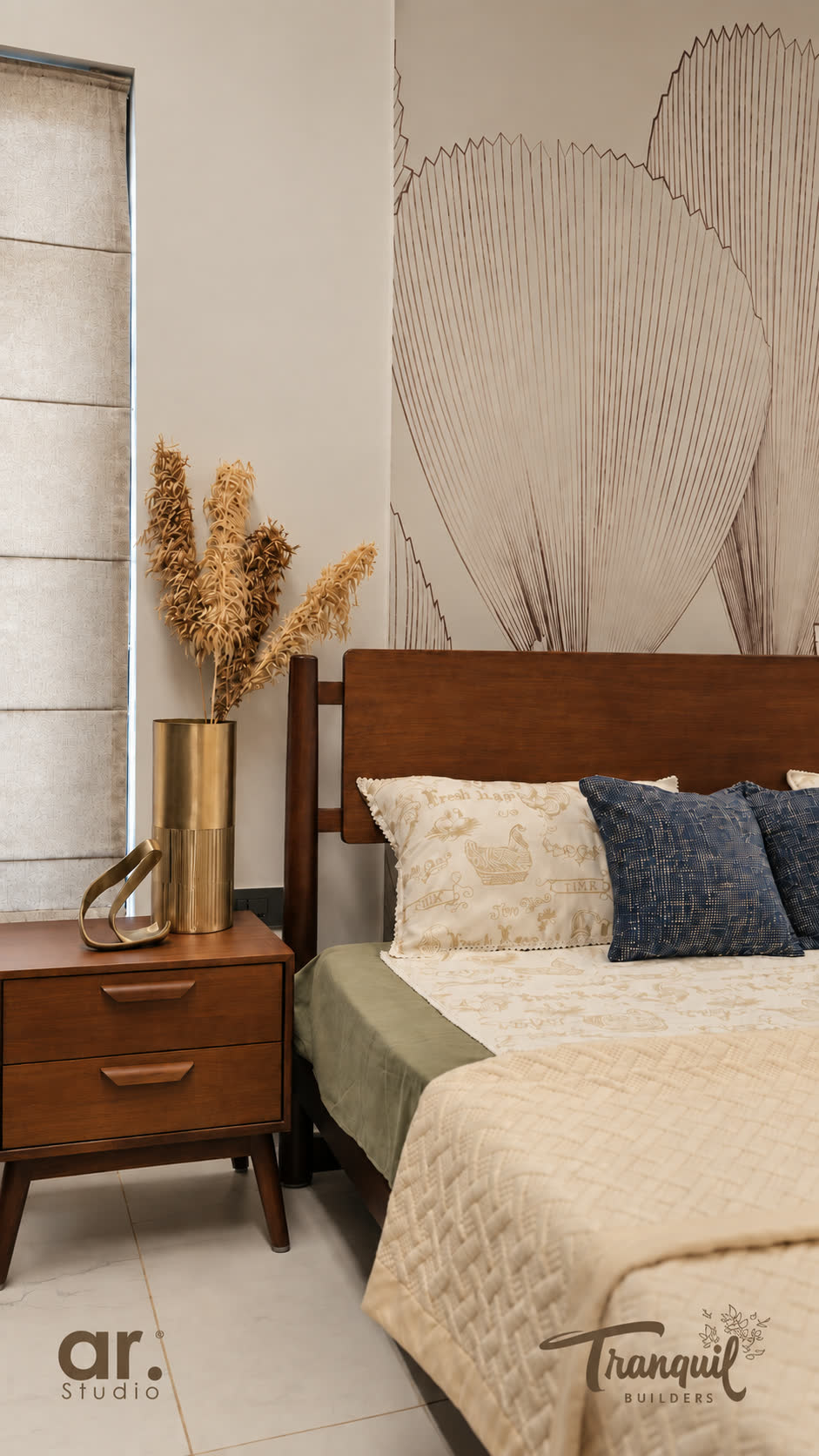 Ajish Residency — the bed and side table in morning light