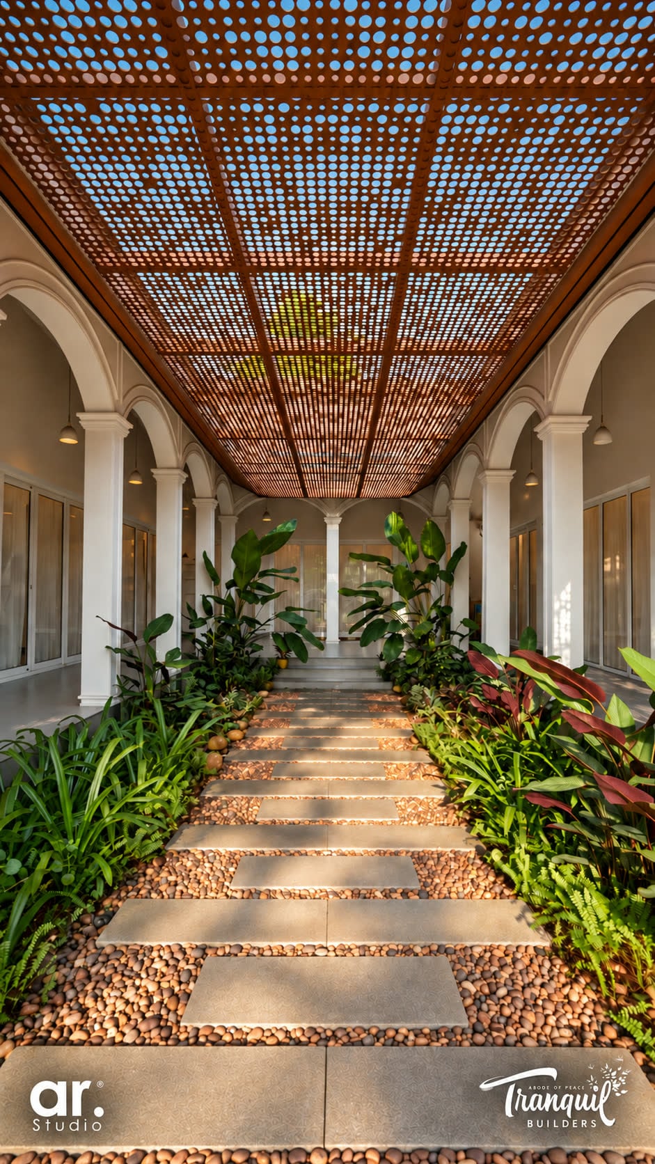 Ajish Residency — light falling through the coloured-glass ceiling panels