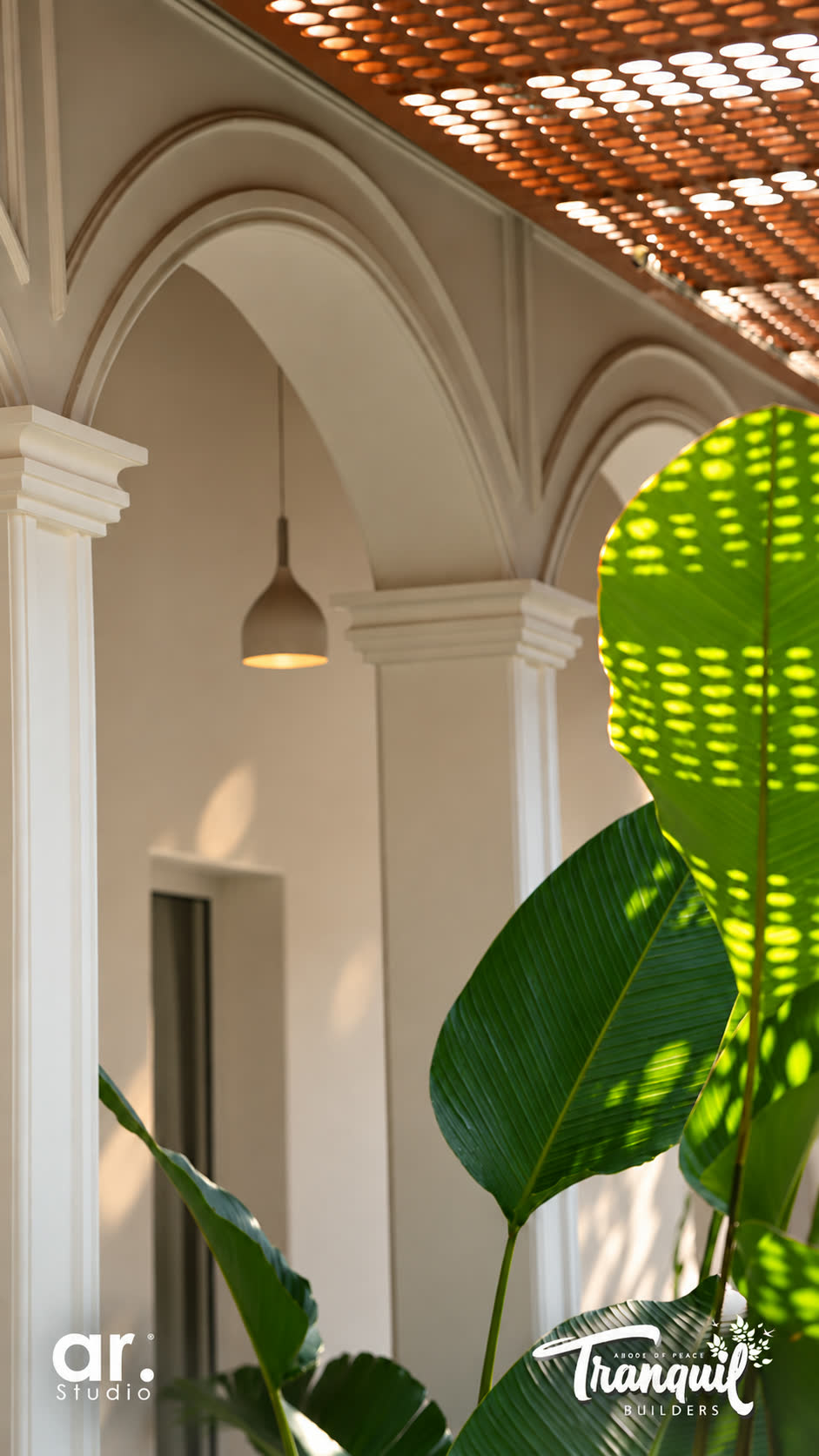 Ajish Residency — the courtyard under its clay-tile pergola