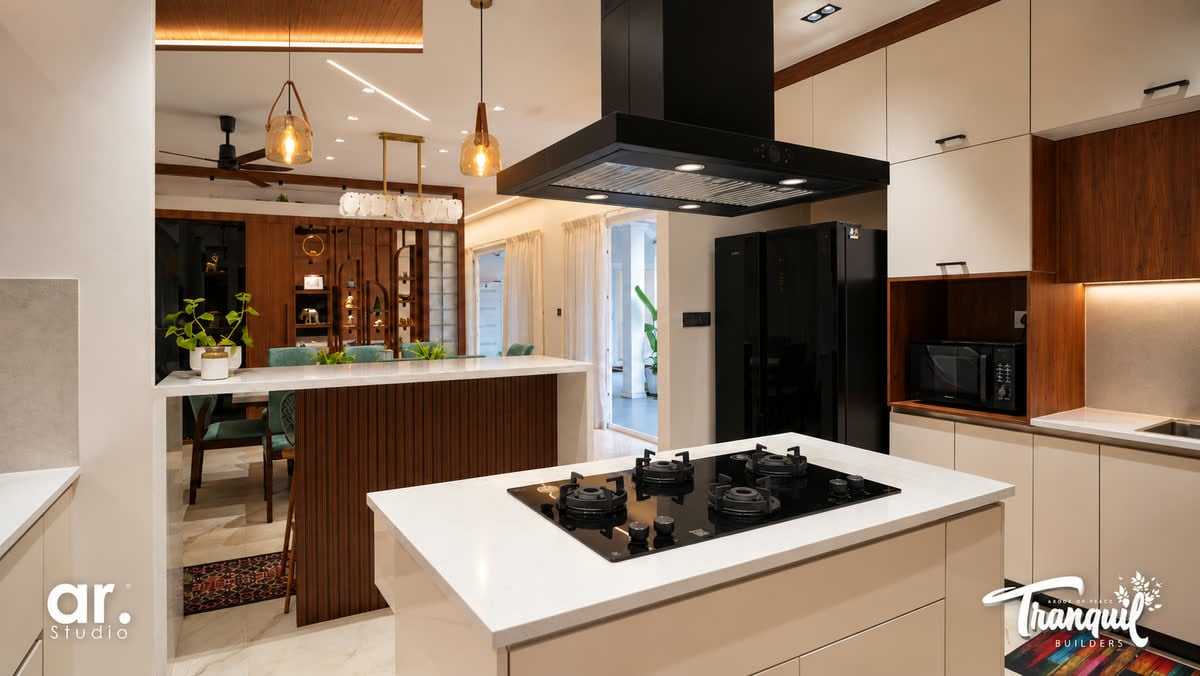 Ajish Residency — the kitchen island, hob and chimney