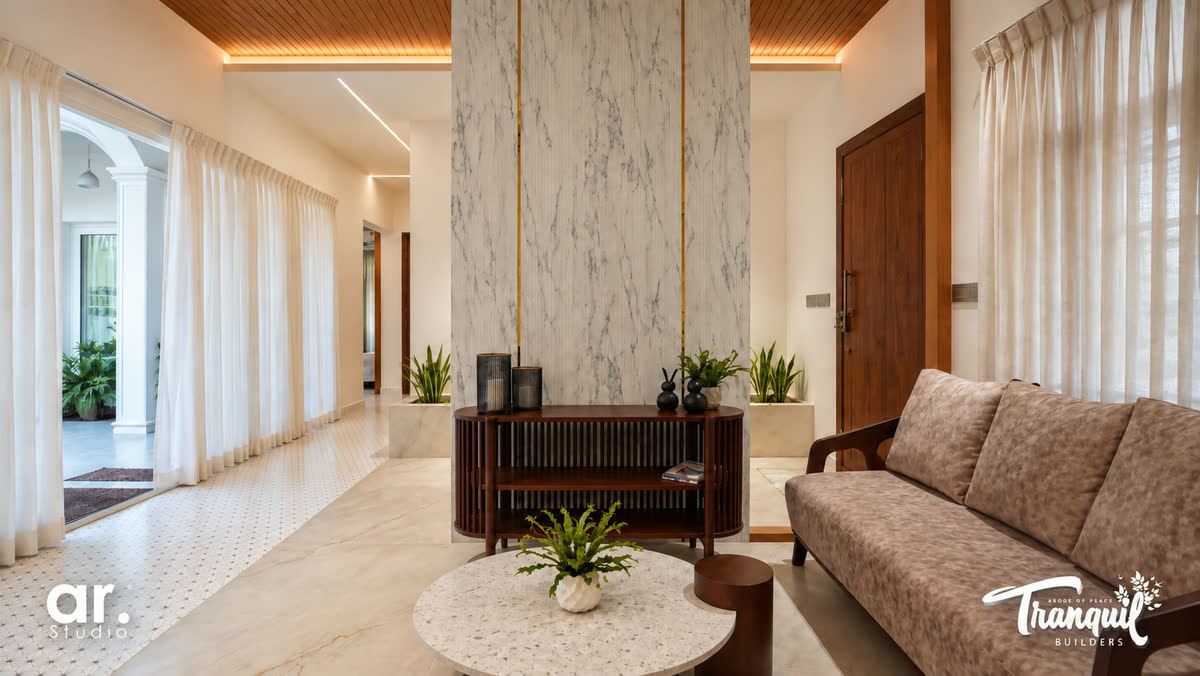 Ajish Residency — the formal living room with its marble feature wall