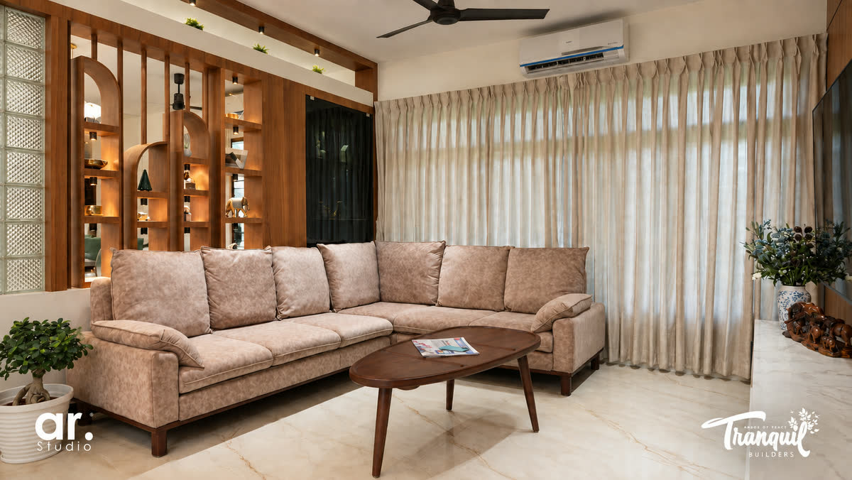 Ajish Residency — seating beneath the backlit display unit