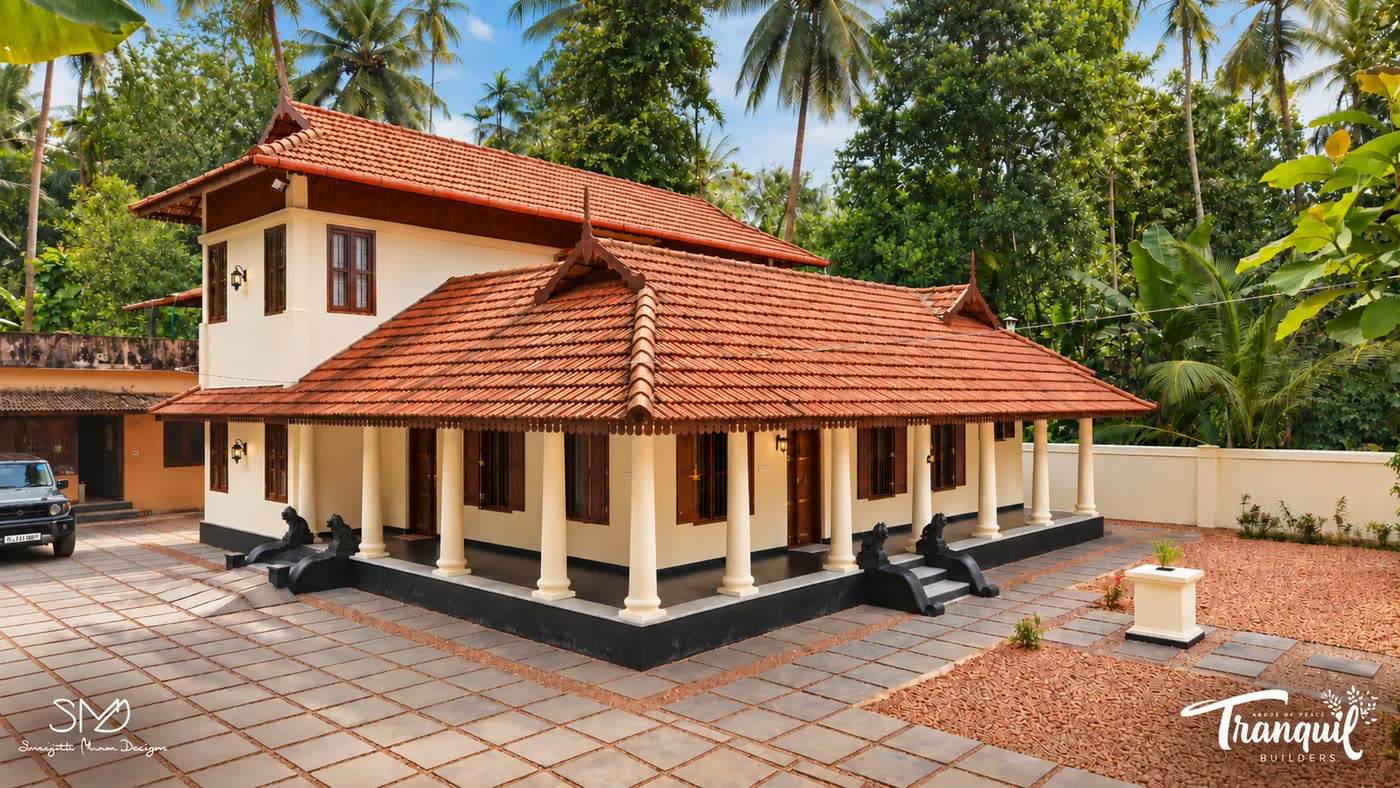 Narayani, a traditional Kerala home with a tiled roof and colonnaded verandah