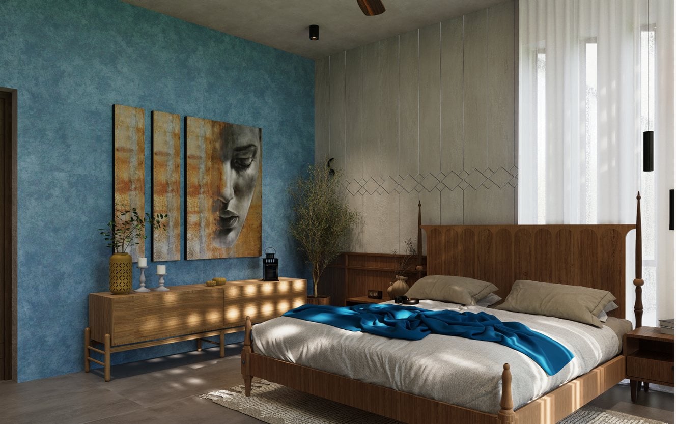 Bedroom with blue accent wall and artwork